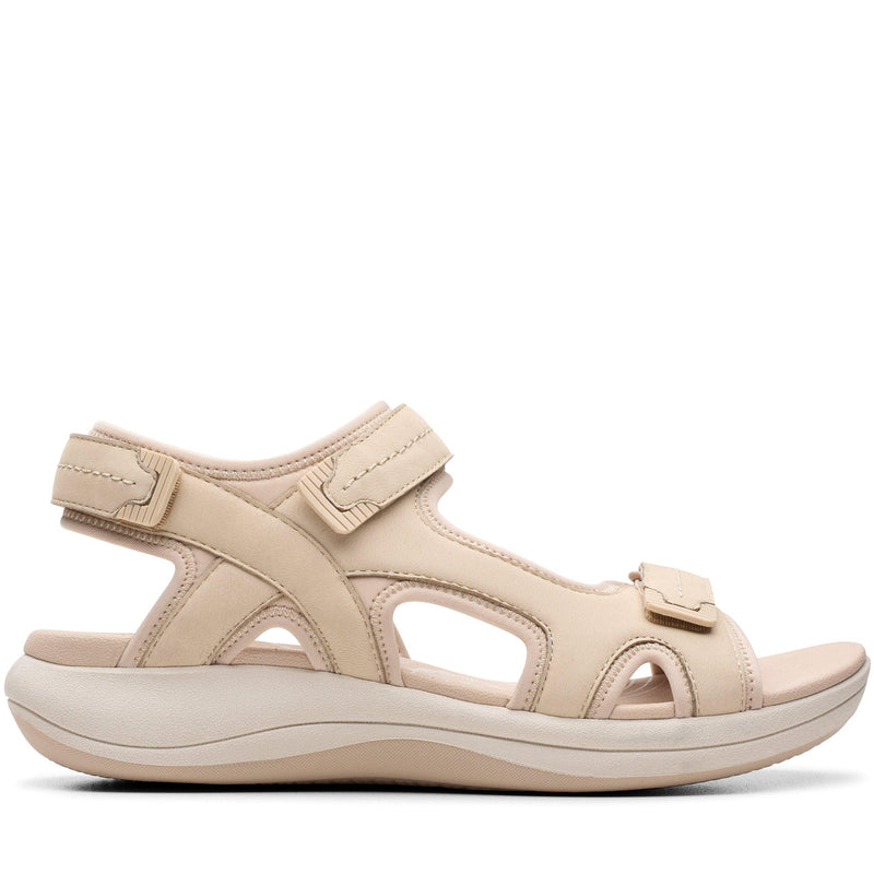 Quarter turn Women's Clarks Footwear style name Mira Free in color Sand Nubuck. Sku: 26182077